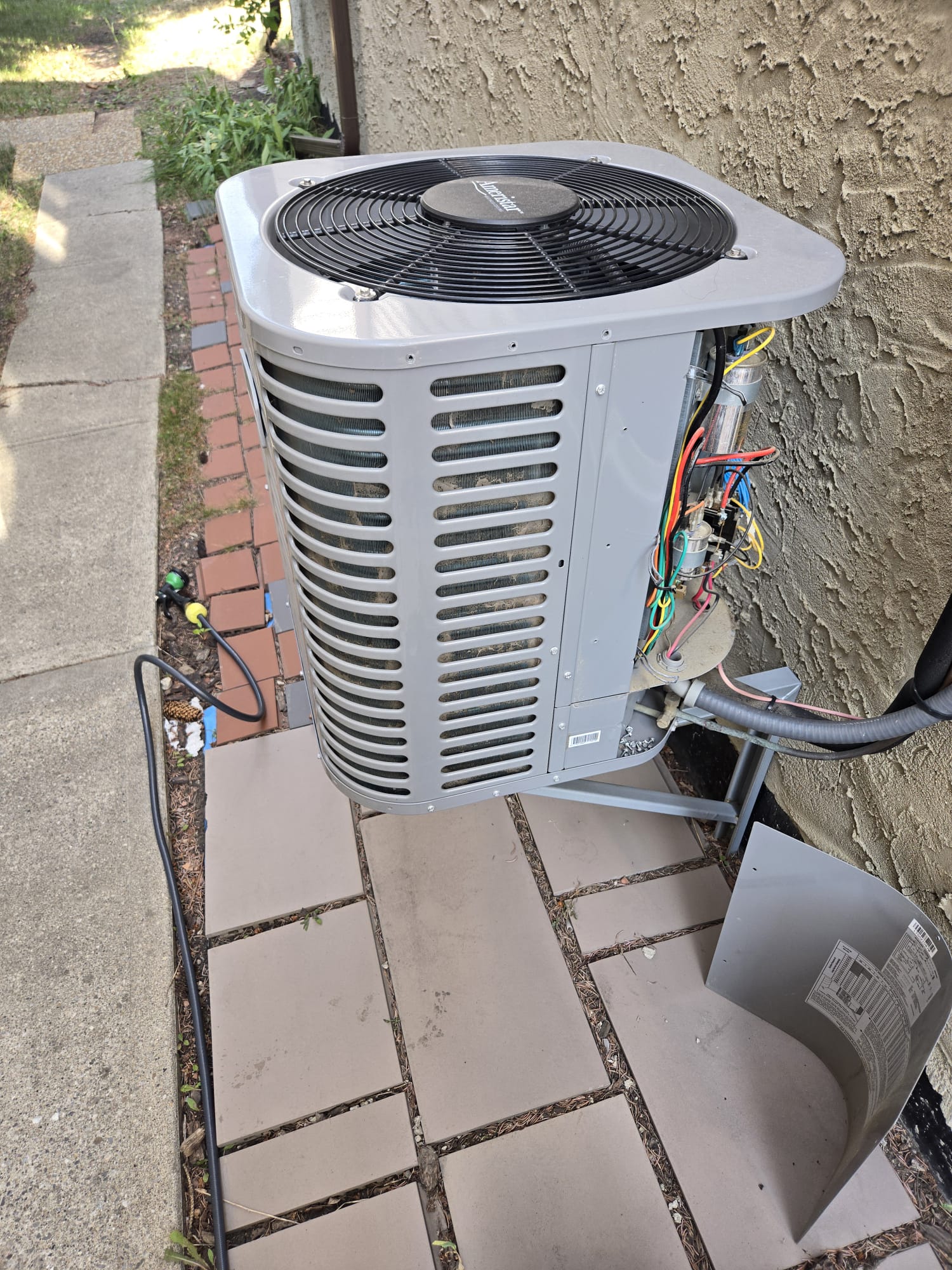 Range hood blower motor exposed for replacement