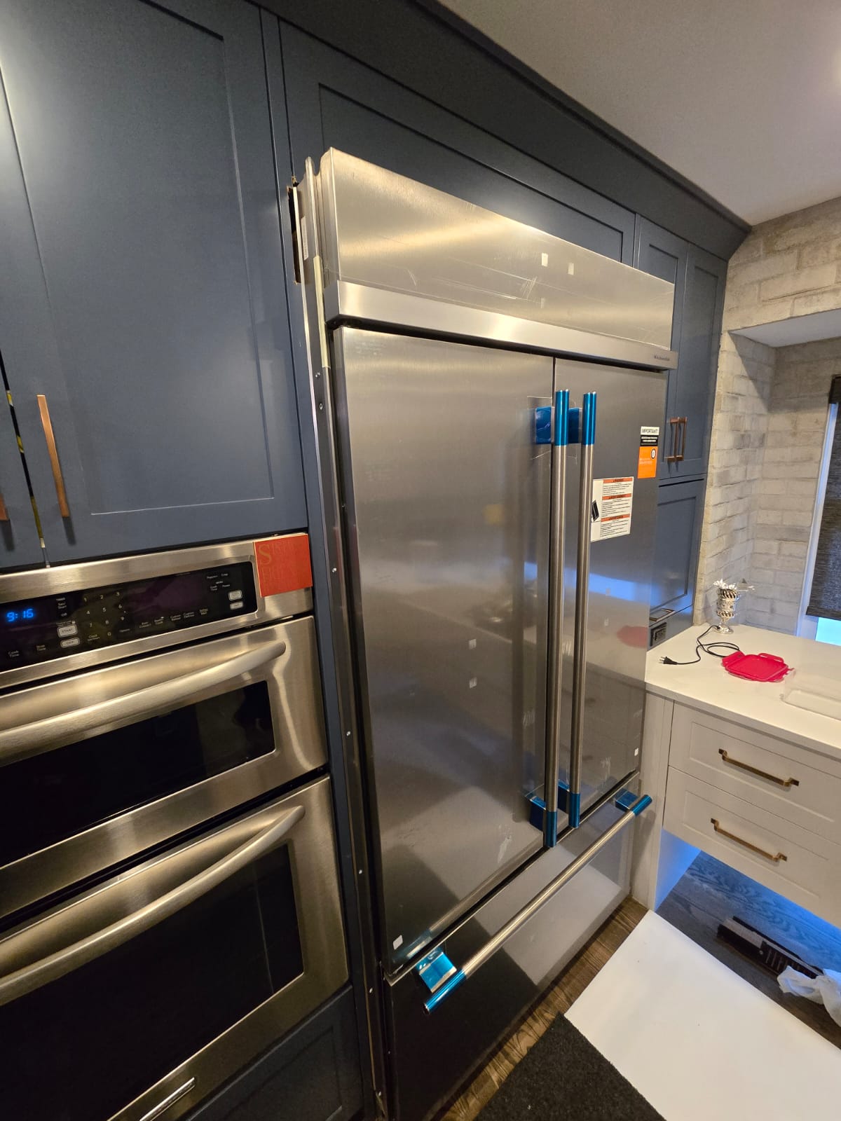 Built-in KitchenAid French-door refrigerator in a customer kitchen