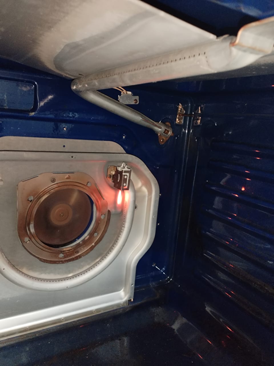 Close-up of a glowing oven igniter during a range diagnostic