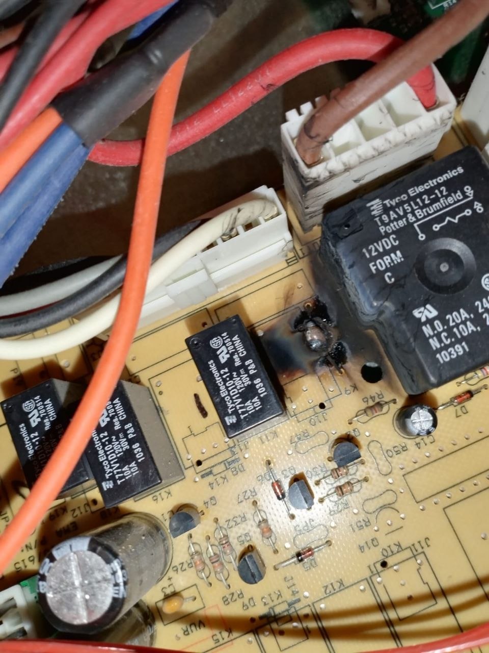 Burnt relay found on an oven power board